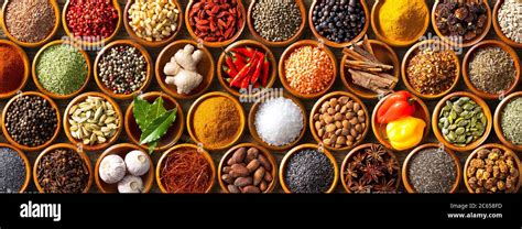 Colourful Background From Various Herbs And Spices For Cooking In Bowls