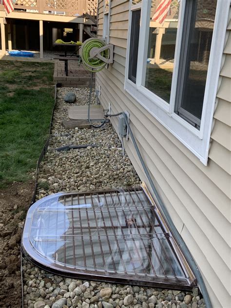 Basement Egress Window Installation - Hole in the Wall
