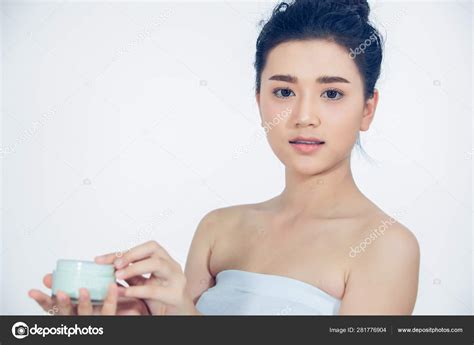 Beautiful Asian Woman Naked Shoulders Using Skin Care Moisturizing