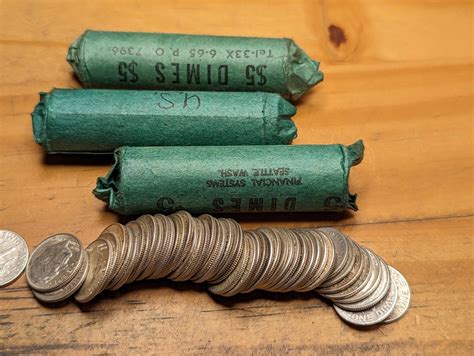 Four rolls of silver dimes at work! : r/Silverbugs