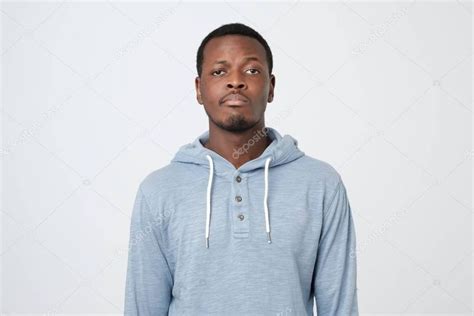 Young African Man With Guilty Confused Expression Human Negative Face