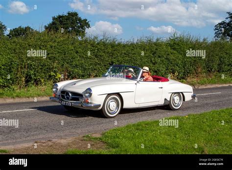 A Front View Of A 1960s 60s Mercedes Benz 190 White Convertible Vintage