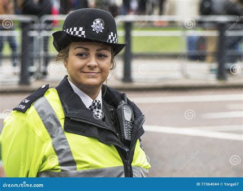 Smiling Policewoman Editorial Stock Image Image Of Uniform 77364044