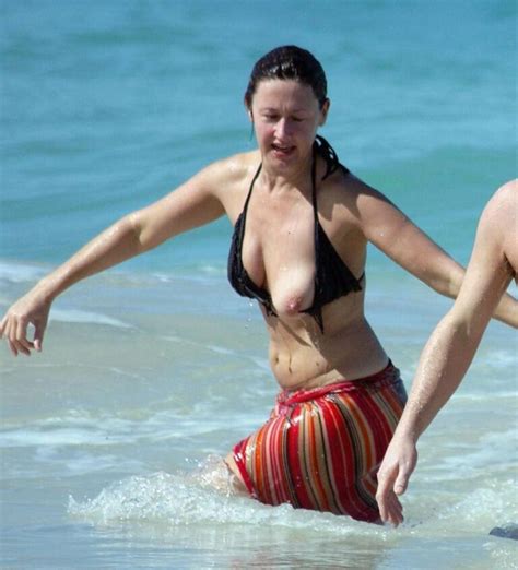 Hot Babe Having Nip Slip Moment At Beach Babes Pics Boobs Flash Pics Brunette Pics Hotwife