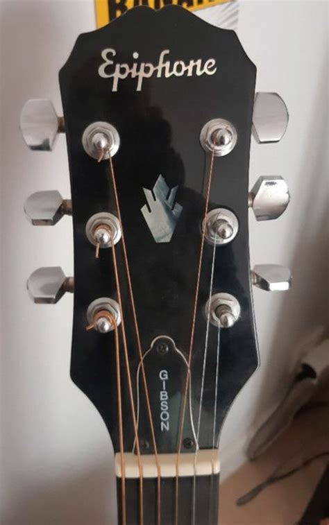 Is this a legit epiphone logo? : r/guitars