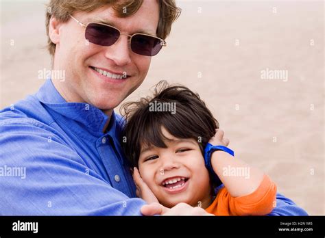 Father And Son Laughing Together Stock Photo Alamy