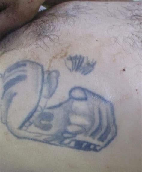 Por Tatuajes Buscan Lograr Identificar Al Ejecutado En Santa Luc A