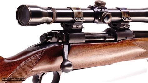 Winchester Pre-64 Model 70 featherweight with VintageGunScopes remanufactured K8