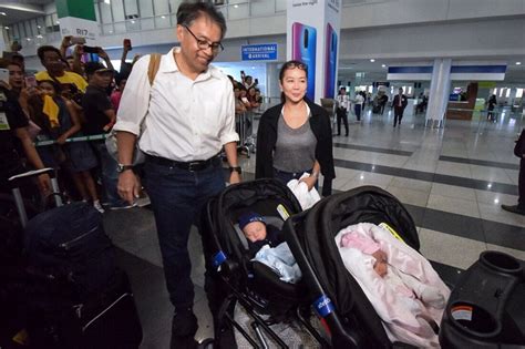 Korina Sanchez, Mar Roxas arrive in Manila with twins