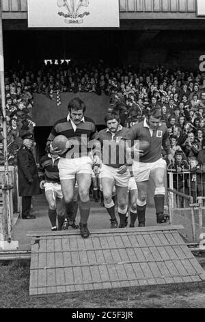 Llanelli Captain Roy Shunto Thomas Holds The WRU Cup Aloft After