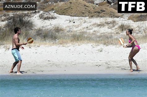 Andrea Schlager Sexy Seen Flaunting Her Hot Figure Wearing A Pink Bikini At The Beach In Greece