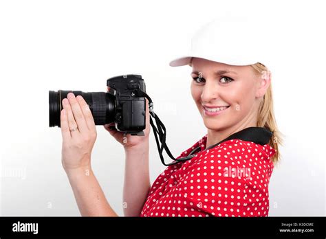 Smiling Pretty Blonde Woman Photographer With Camera On White Stock Photo Alamy