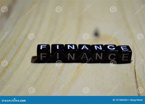 finance written  wooden blocks inspiration  motivation concepts