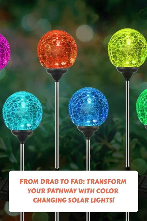 Four Solar Powered Garden Lights In Different Colors And Sizes With