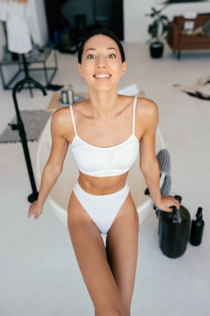 Free Photo Attractive Woman In Lingerie Posing Near The Bath Girl Posing For The Camera