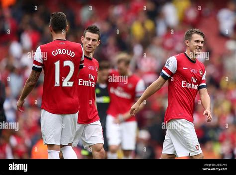 Arsenals Aaron Ramsey Right Celebrates After The Final Whistle With