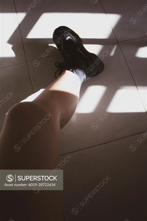 Naked Woman Legs With Black Boots Superstock