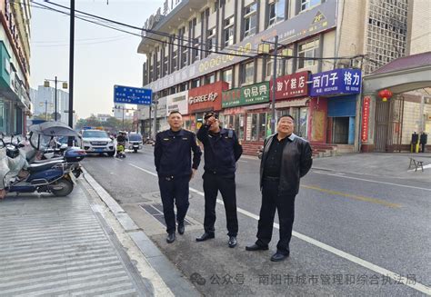 内乡城管：拆除遮窗广告 消除安全隐患城管动态南阳市城市管理局