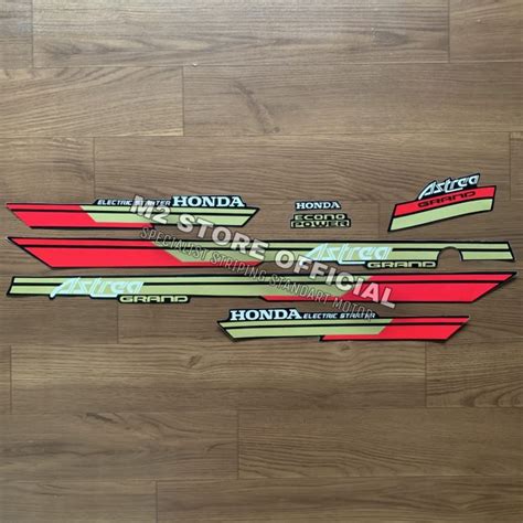 Striping Polet Honda Astrea Grand Bulus Kapsul Merah Gold