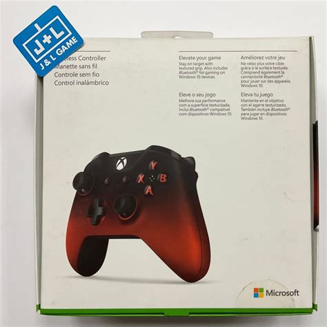 the box is open to show an image of a video game controller in red and black