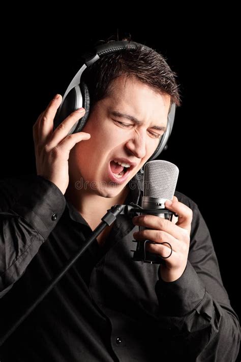 Male Singer Singing Into Old Fashioned Microphone Stock Photo - Image ...