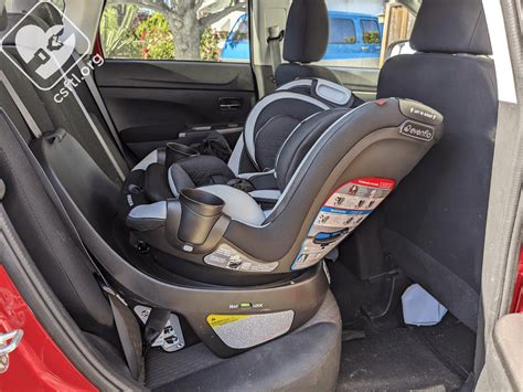 how to remove evenflo revolve car seat from base