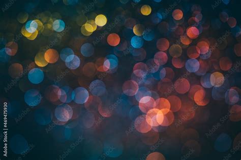 Neon Bokeh Background With Blue Yellow And Pink Colors On Black Blur