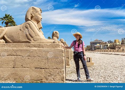 Woman Tourist At Sphinx Allee In Luxor Stock Photo Image Of Ancient