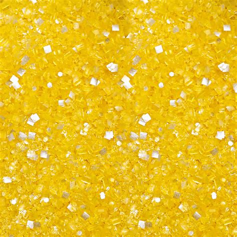 Download A Close Up Of A Yellow And Silver Glitter Wallpaper ...