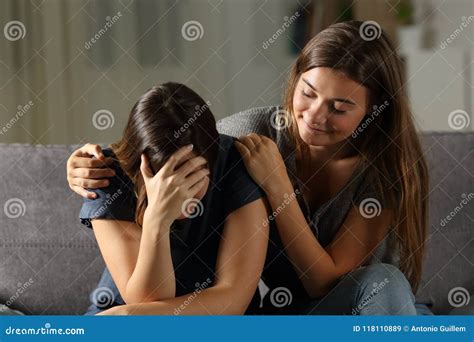 Bad Hypocrite Friend Comforting a Sad Girl Stock Image - Image of ...