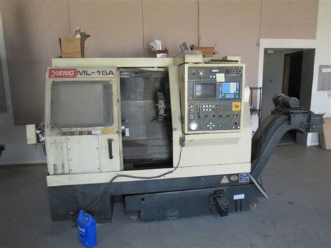 Yang ML 15A CNC Lathe W Fanuc Controls Chip Conveyor For Parts Or