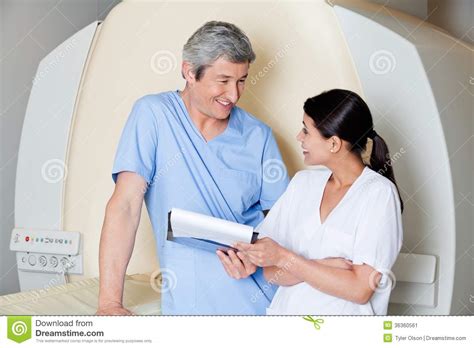 Radiologic Technicians Smiling At Each Other Stock Image Image Of