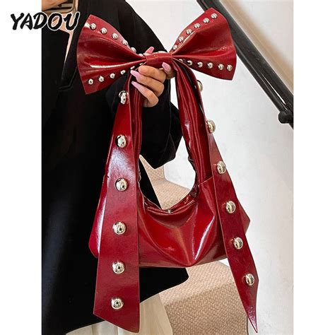 YADOU American Hot Girl Phong Cách Thời Trang Đinh Tán Túi Xe Máy Ngọt Mát Đặc Biệt Thiết Kế Nơ