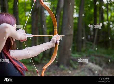 Female Archer With Wooden Bow Stock Photo Alamy