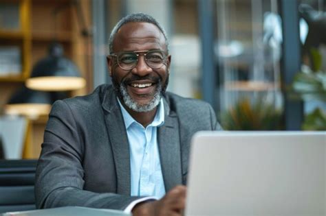 Premium Photo Successful Mature Businessman Working On Laptop In