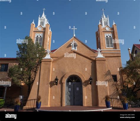 Exterior Of Adobe Colored San Felipe De Neri Roman Catholic Church In