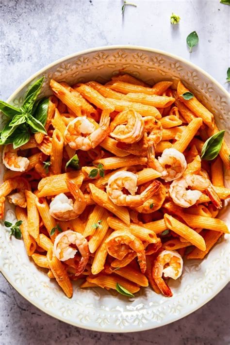 Plump Shrimp And Penne Pasta Smothered In A Creamy Tomato Sauce