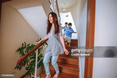 Boy Going Down Stairs Photos and Premium High Res Pictures - Getty Images