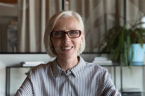 Headshot Portrait Of Smiling Mature Woman Worker Have Webcam Call Stock Photo Image Of
