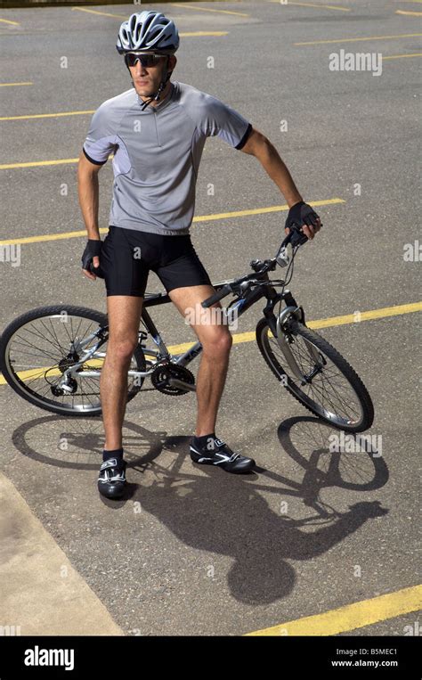 A man with a mountain bike Stock Photo - Alamy