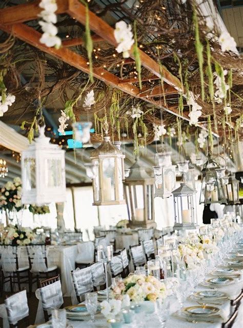 Wt H E D E C O R A T I O N S Hanging From The Rafters Country Wedding Reception Greenery