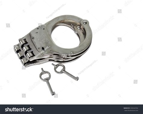 Handcuffs Key Stock Photo (Edit Now) 334544762