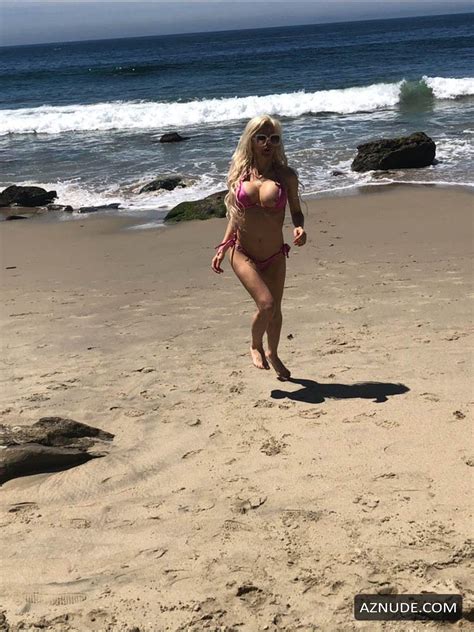 Angelique Morgan Frenchy Has A Wardrobe Malfunction While Adjusting Her Tiny Bikini On The Beach