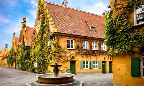 Inside Fuggerei in Germany, where the rent hasn't gone up in 500 YEARS ...