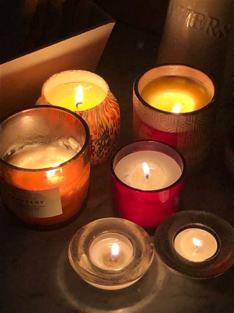 A Photo Of Several Candles In Dim Lighting Candle Aesthetic Autumn