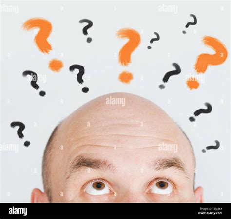 Man Thinking With Question Marks Stock Photo Alamy