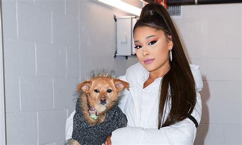 Ariana Grande Shows Puppy Love With Her Dog Toulouse As She Serves