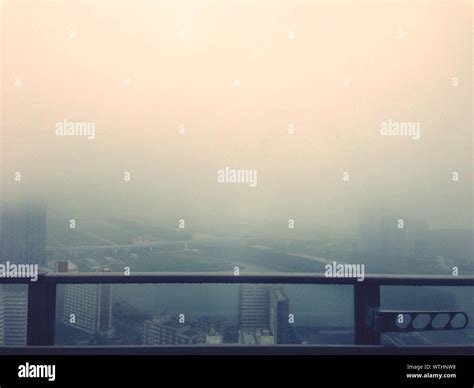 View Of A Foggy City Stock Photo - Alamy