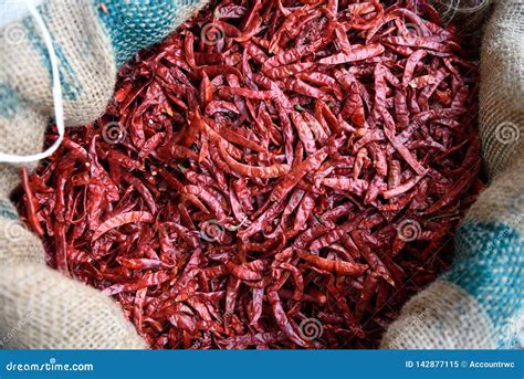 Basket Of Fresh Dried Red Chili Peppers In Spice Market Stock Image