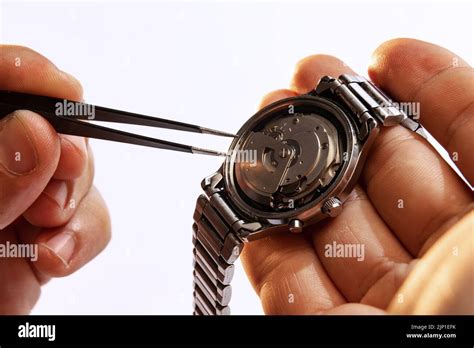 Closeup Watchmaker S Hands Repairing Mechanical Watches Isolated Over